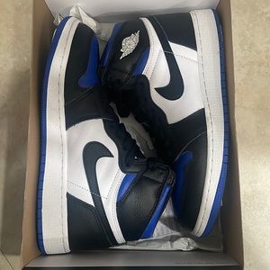 New Nike Mid Blue Jordan’s. Comes with Receipt.